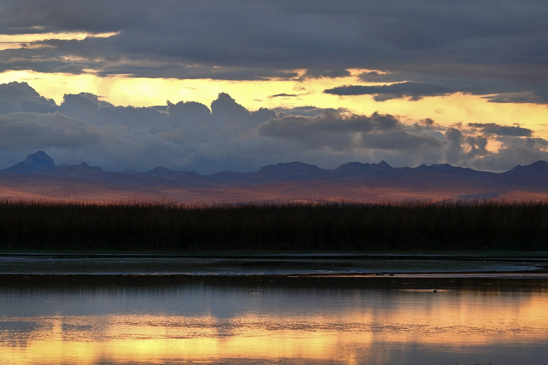 Evening light over Lake Junín and the Andean highlands in Peru